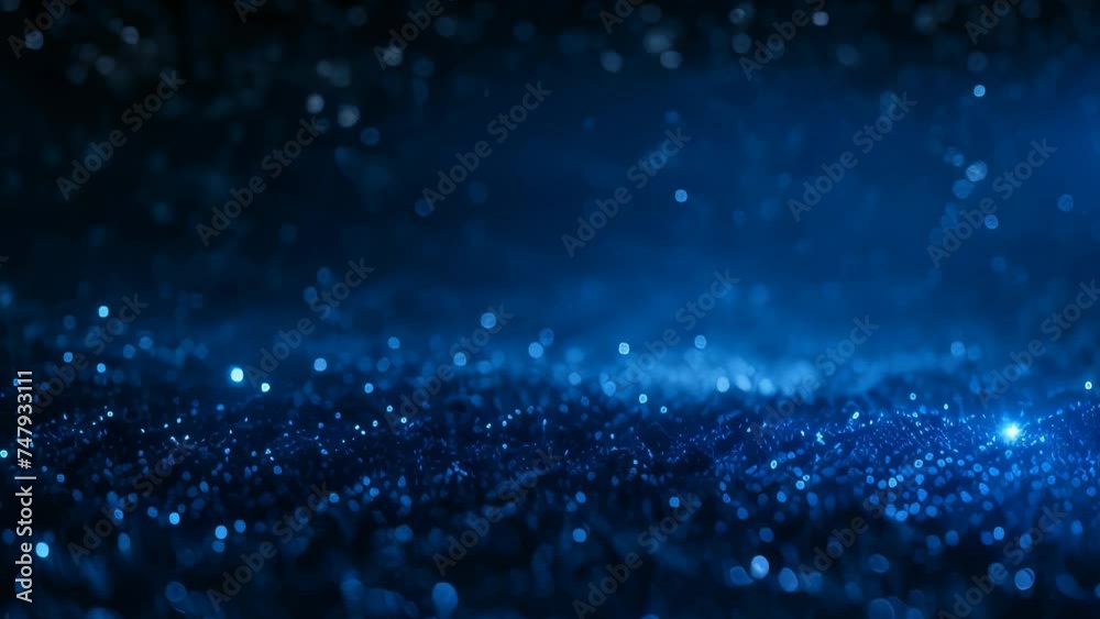 Video animation background of  numerous small, glowing blue lights scattered across a dark background, creating an effect reminiscent of stars in the night sky or particles in deep space