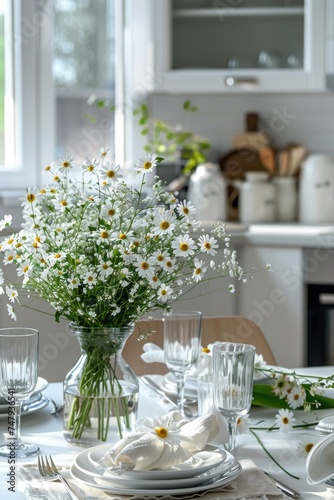 A simple arrangement of daisies in a vase on a dining table. Perfect for home decor or floral themes