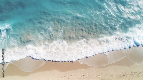 Aerial view of a beach with a surfboard. Ideal for travel and leisure concepts