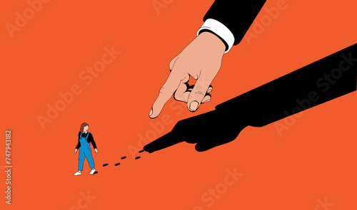 Finger and shadow pointing to woman’s carbon footprint