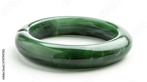 Genuine natural jadeite jade bangle isolated on white background.