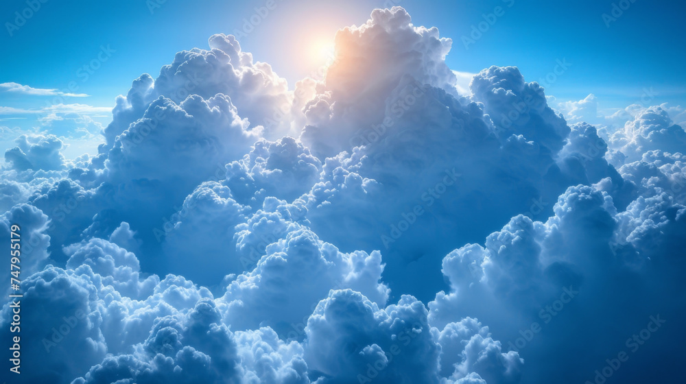 Naklejka premium Texture of towering cumulus clouds with a mix of light and shadows creating a dramatic contrast.