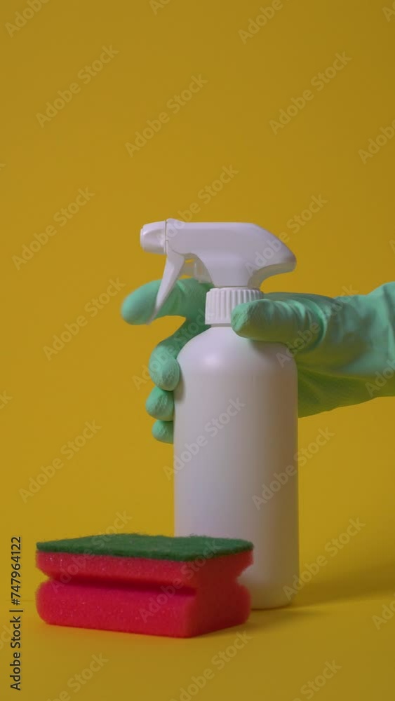 Close Up of Gloved Hand Pressing Spray Cleaner Next To The Sponge, Vertical Video Close Up of Gloved Hand Pressing Spray Cleaner Next To The Sponge, Vertical Video