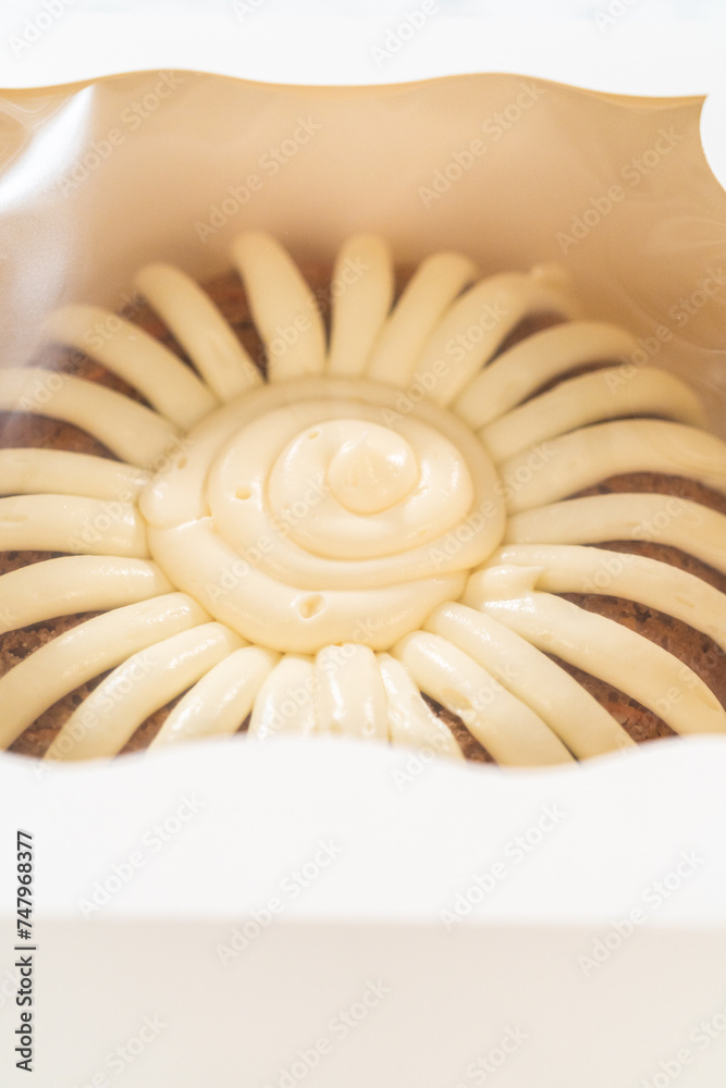 Obraz premium Sweet Treat: Carrot Bundt Cake in Paper Box