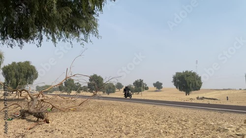 The national highway between Jodhpur and Jaisalmer goes through the beautiful landscape of the Thar desert in Rajasthan state in India. photo