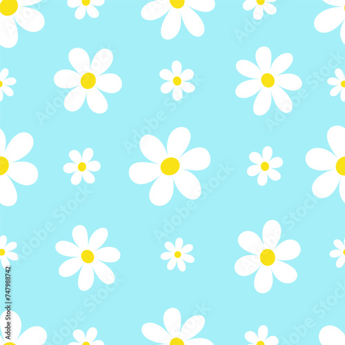 White chamomile flowers on blue background seamless pattern