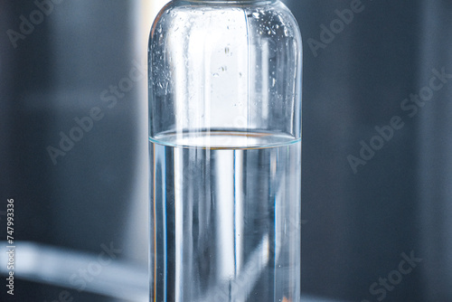 Photos Glass bottle with clean water