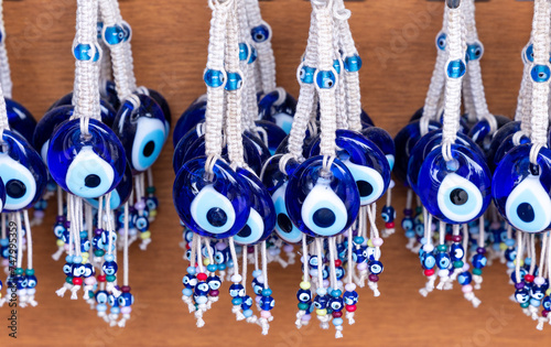 Traditional turkish souvenir. Handmade amulet gift with eye form Turkey. Evil eye beads, souvenir from the holiday. A variety of souvenirs.