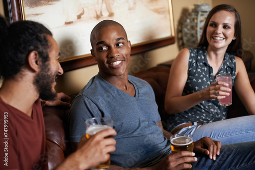 Friends, beer and drinks at pub, smile and relax indoor for glass and bonding in summer to diverse. Male people, bar and chill for social, guys and alcohol together and laughing for fun and weekend. photo
