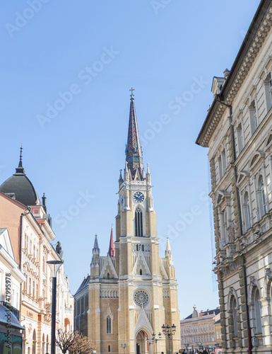 Roman Catholic church in Novi Sad, Serbia, blending neo-Gothic architecture with historical charm, in the city center, inviting tourists to explore its cultural and religious significance .