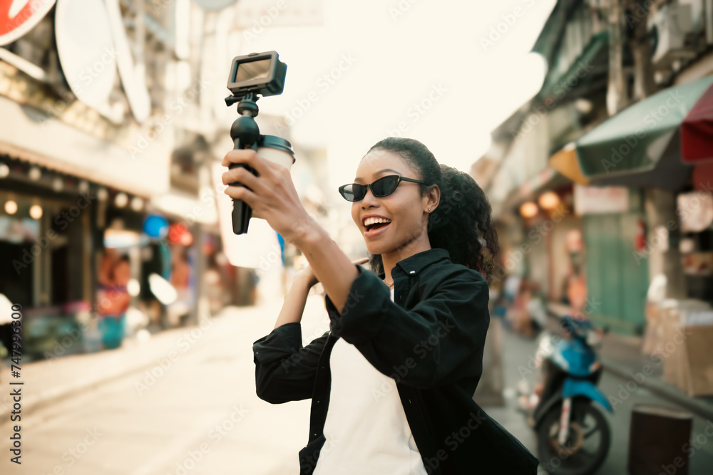 Asian woman enjoy travel in  downtown district