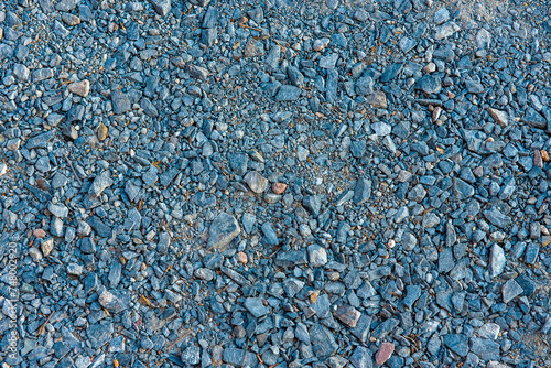 Obraz na plátně blue pebbles and ground earth pavement nature