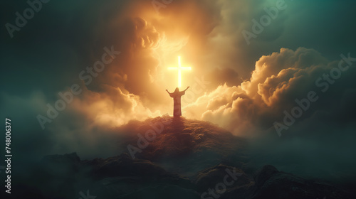 Silhouette of person praying to GOD in front of majestic clouds with glowing cross photo