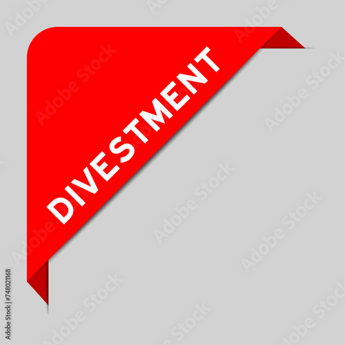 Red color of corner label banner with word divsetment on gray background