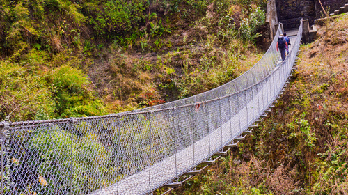 Fototapeta Naklejka Na Ścianę i Meble -  Mountain River from Suspension Footbridge, Mountain Footpath, Trek to Annapurna Base Camp, Annapurna Conservation Area, Himalaya, Nepal, Asia