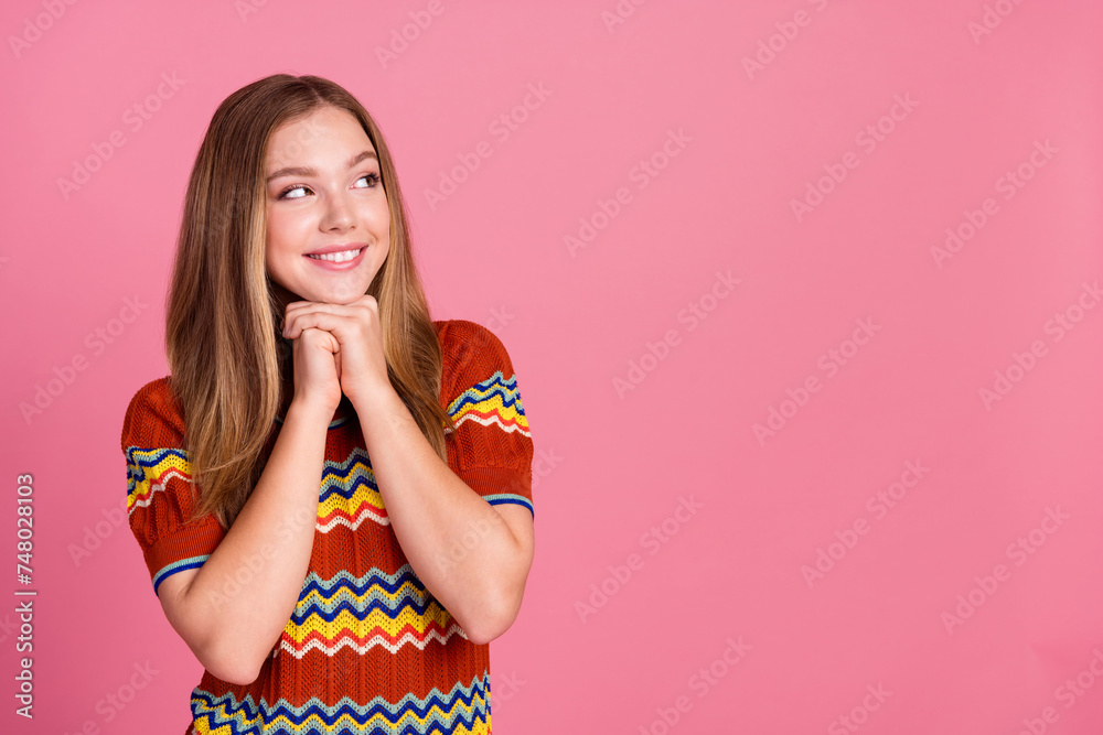 Portrait of adorable minded girl arms under chin look empty space fantasize isolated on pink color background Portrait of adorable minded girl arms under chin look empty space fantasize isolated on pink color background