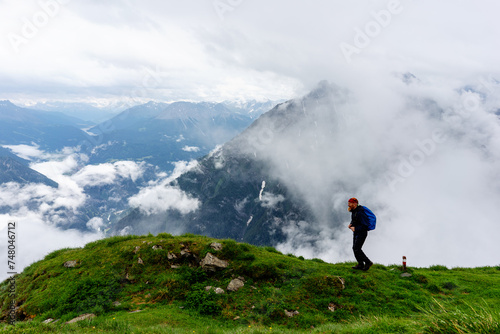 man on the top of mountain