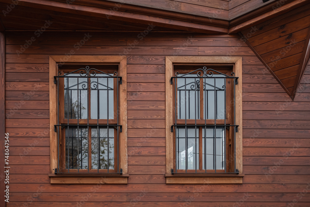 House made of laminated veneer lumber. Cottage made of laminated wood. Houses made of wood