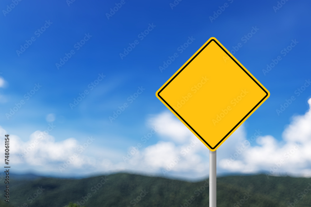 Blank yellow road sign or Empty traffic signs on mountain and sky view background Blank yellow road sign or Empty traffic signs on mountain and sky view background