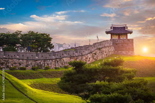 Hwaseong Fortress in Sunset, Traditional Architecture of Korea at Suwon, South Korea. photo