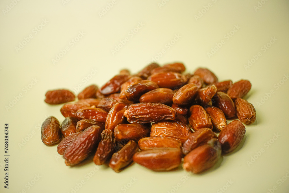 dried dates (Phoenix dactylifera) in a bowl, Ramadan fruit. 