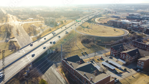 Aerial view Interstate 235 highway loop function as a bypass for through traffic on Centennial Expressway Oklahoma City, downtown condos loft, apartment complex, office buildings metro complex photo