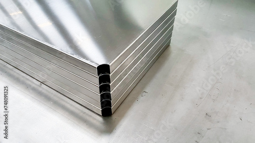 Metal stainless sheet bending on hydraulic machine.  bending stainless sheet. photo