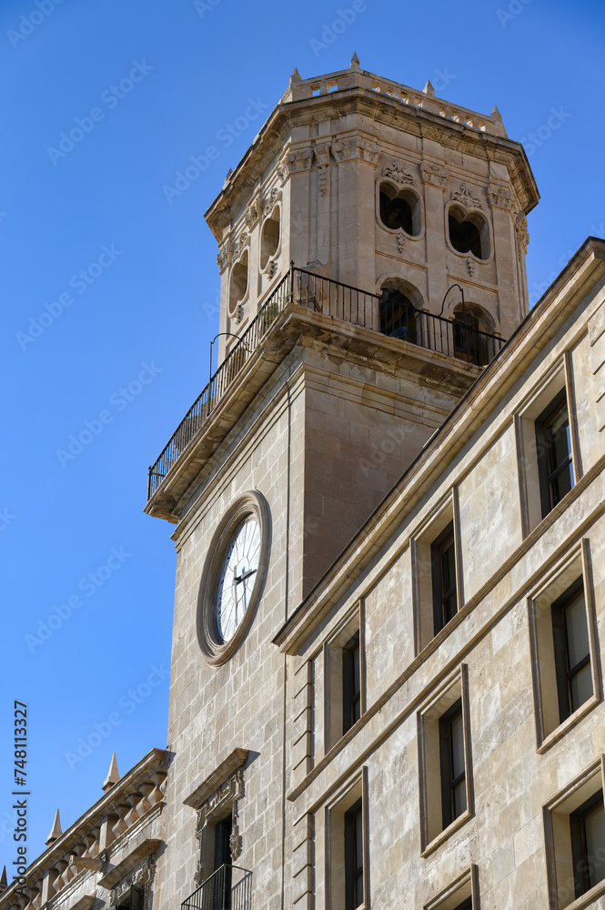 Side view of clock tower in the City Hall building, Alicante, Sp
