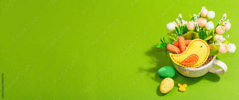 Easter bouquet in a cup. Traditional flowers, decorative quail eggs. Trendy green background