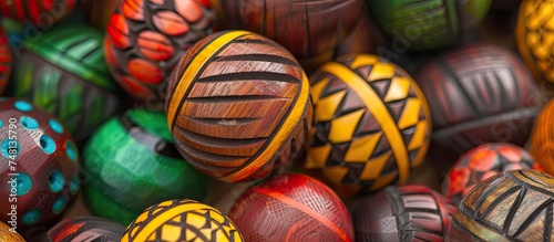 A detailed view of a cluster of painted eggs  showcasing the vibrant colors and intricate designs on each egg. Each egg is uniquely painted and placed closely together in the frame  highlighting the