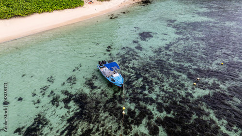 panoramic drone view of the coast of the Seychelles with bays and white catamarans