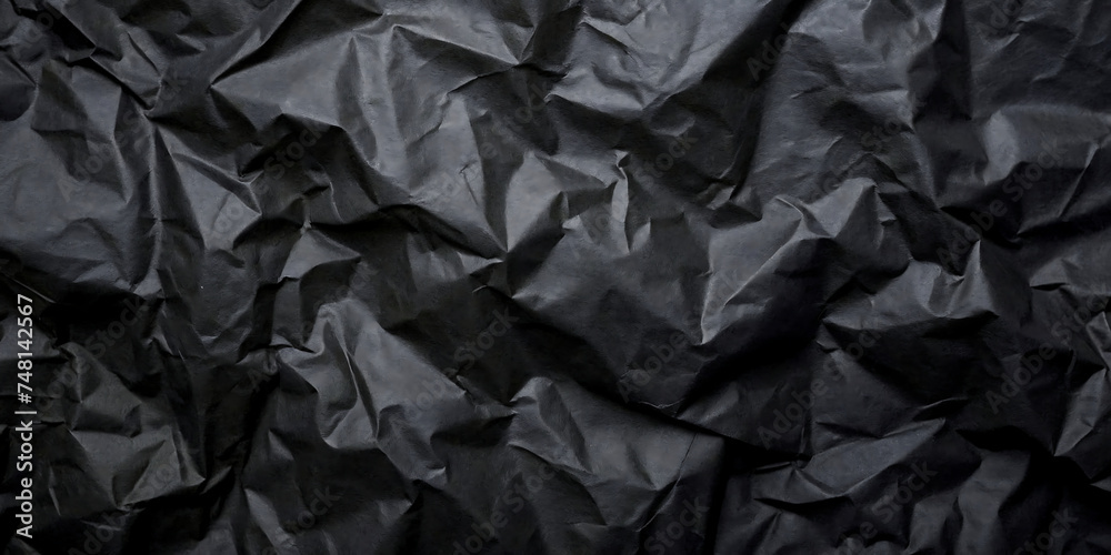 crumpled black paper background crumpled black paper background