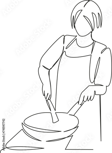 woman cooking frying in a frying pan