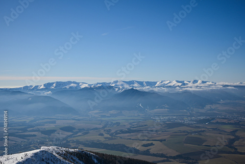 beautiful view from Mount Baranec in the Western Tatras to the Low Tatras (Chopok) Winter weather, lots of snow