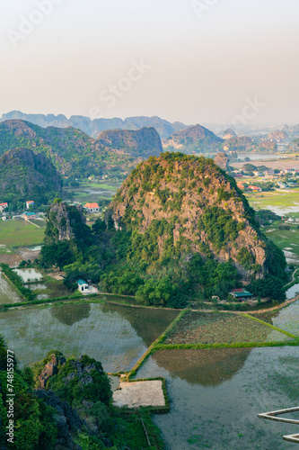 Sunset Views of of Dam sen Hang Mua in Northern Vietnam Overlooking the Ninh Binh Region of rice fields. 