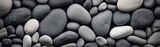 black and white pebbles background, top view, flat lay. Travel and vacation concept with copy space. Spa Concept.