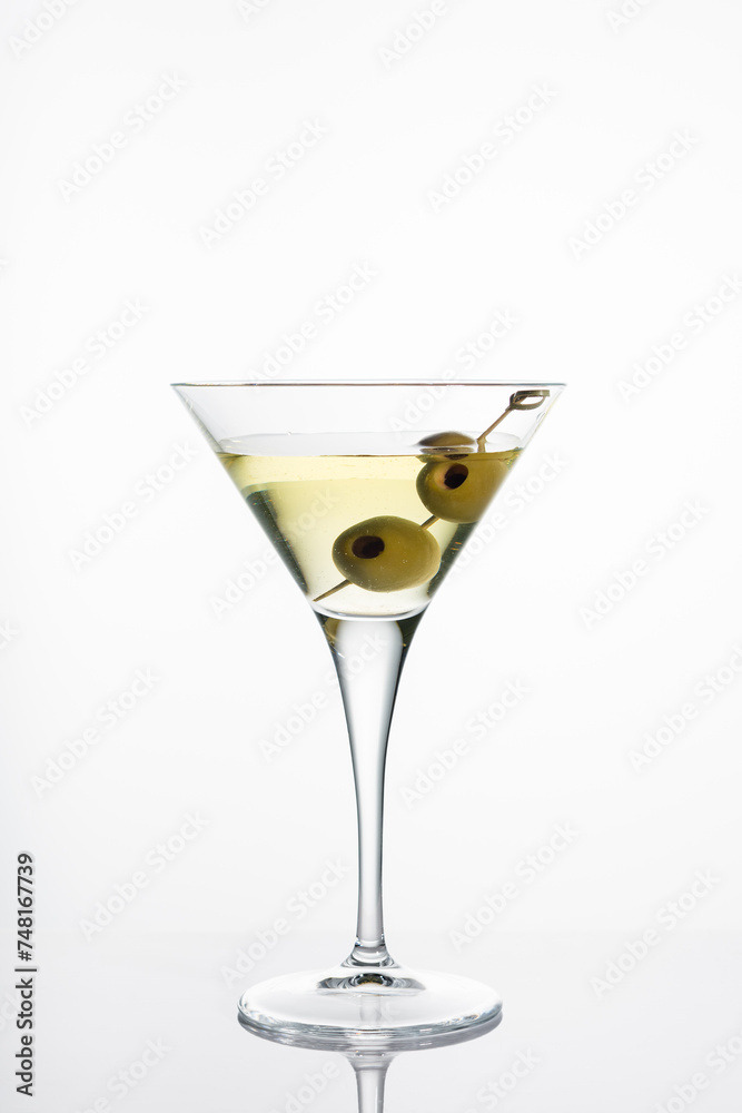 Martini glass with olive.