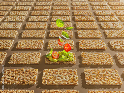A crispbread with avocado cream between rows of crispbread slices