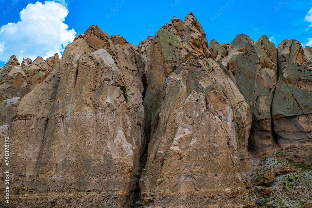 Textured Sandstone Peaks Under Blue Skies in Ardabil Province, Iran