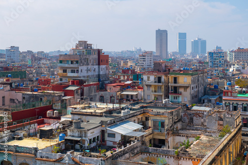 Central Havana (Centro Havana) aerial view with modern skyscrapers in Vedado at the background, Havana, Cuba. Old Havana is a World Heritage Site.  © Wangkun Jia