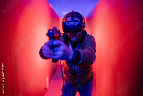 A man wearing a virtual reality headset with the word vive on it