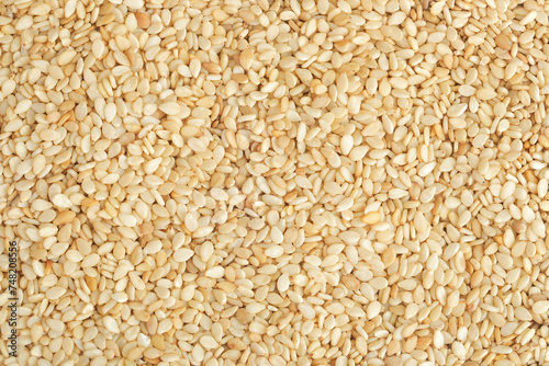 Sesame seeds as a background. Top view. Flat lay © kolesnikovserg