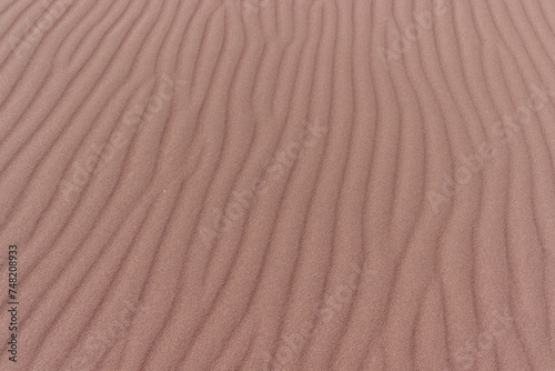 Sand formations with ripples regular pattern.