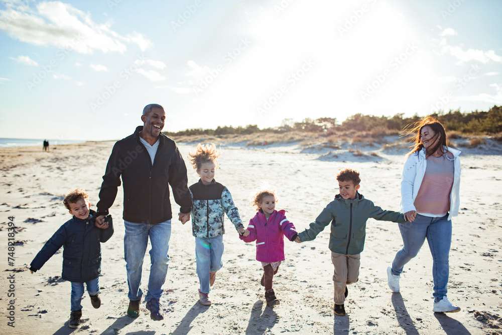 Family enjoying a day at the beach Family enjoying a day at the beach