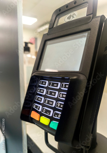 Payment terminal fixed to a counter-top photo