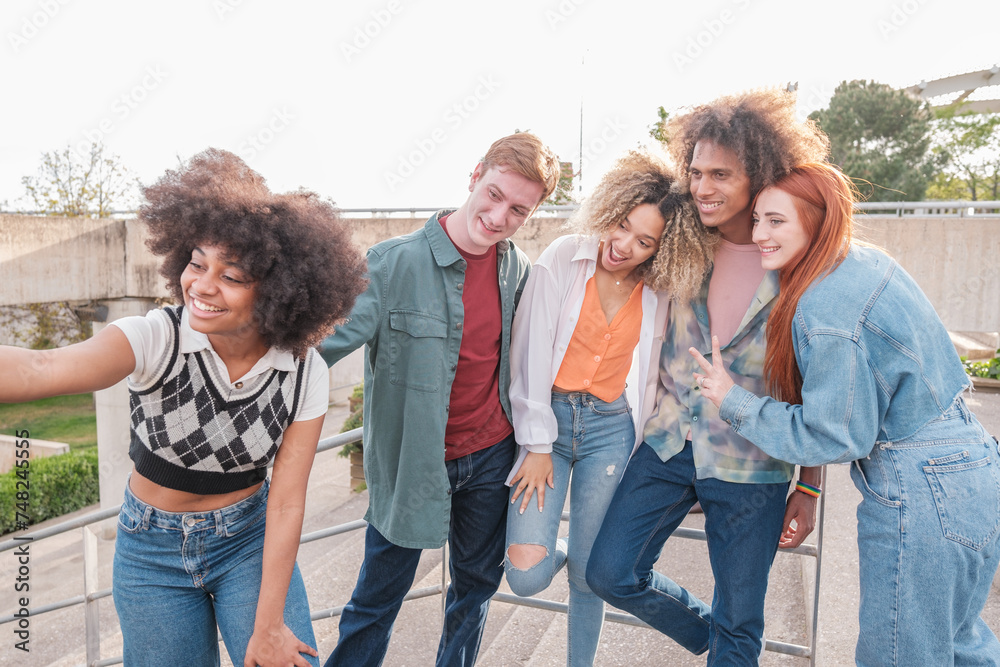 Group of student friends taking a selfie when leaving class. Concept: friendship, lifestyle