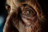 Detailed close-up shot capturing the textures and patterns of an elderly woman's eye reflecting experience and wisdom