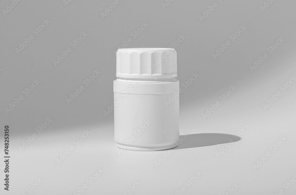 White medical jar for pills, capsules, vitamins and medicines White medical jar for pills, capsules, vitamins and medicines