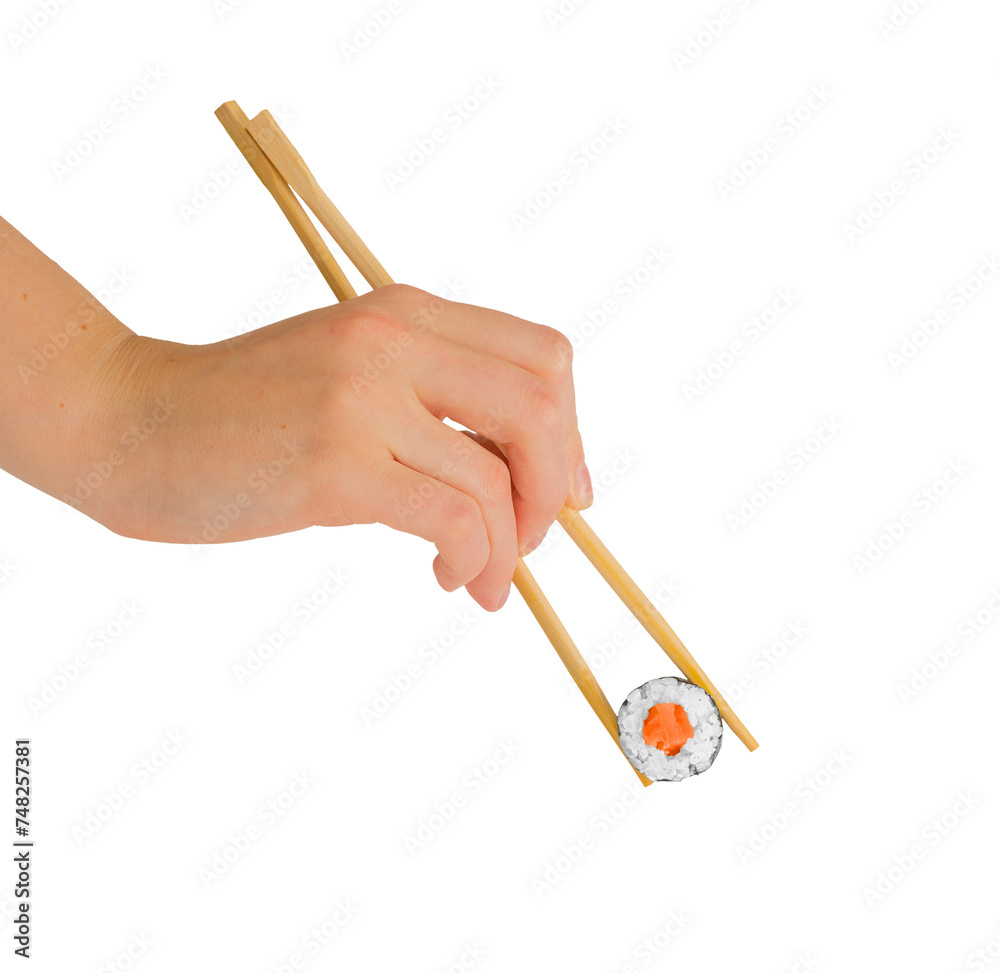Hand with chopsticks eating maki roll, sushi with rice and salmon, isolated on white Hand with chopsticks eating maki roll, sushi with rice and salmon, isolated on white
