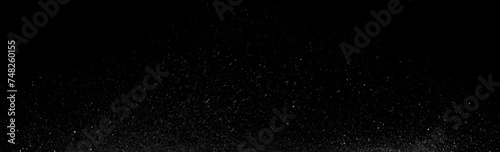 Abstract black background covered with white paint spray. Wide panoramic. Template web design banner